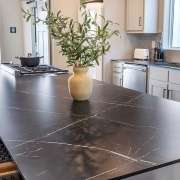 Sleek sophistication: Black island centerpiece​