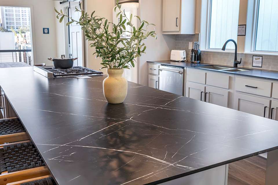 Sleek sophistication: Black island centerpiece​