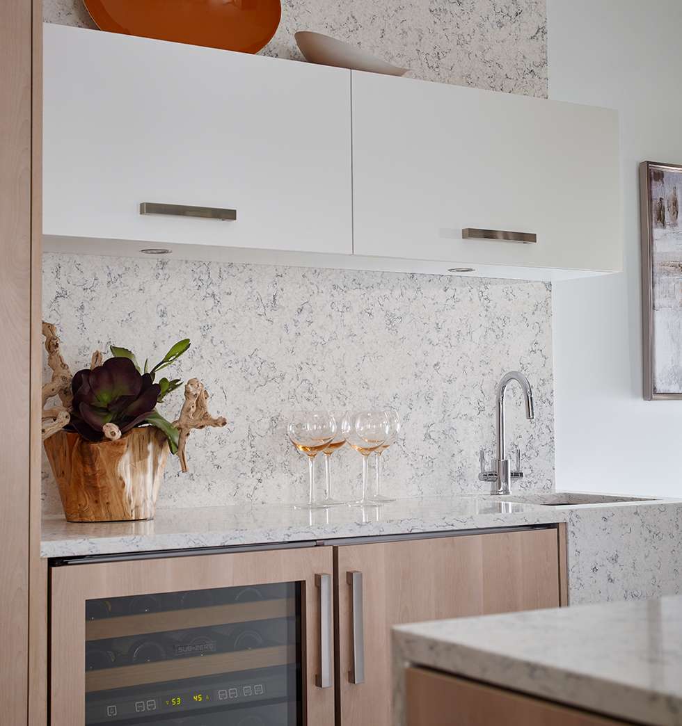 Light Modern Wine Bar with Quartz Countertop and Backsplash