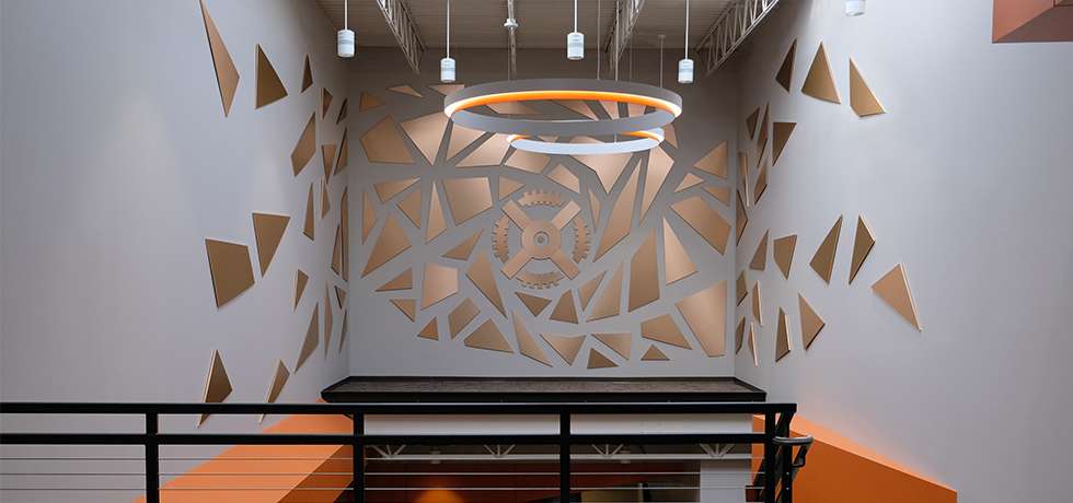Generac Sculpture Installation | Decorative Metals in Brushed Penny