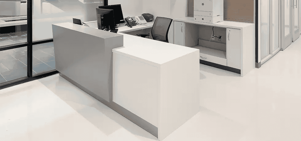 Welcome Desk | Solid Surface in Yukon Riverstone