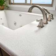 Morning Ice | Solid Surface Bath | a beautiful white quartz look full of medium scale translucent white, grey and mirror particulates